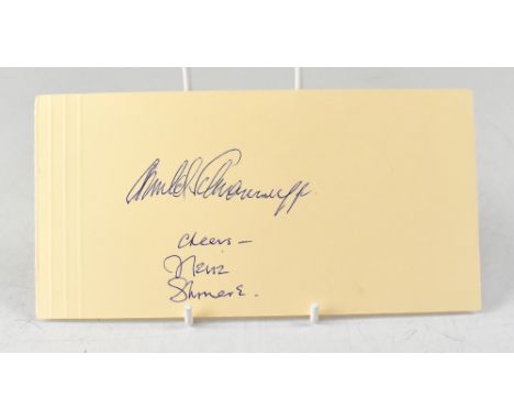 ARNOLD SCHWARZENEGGER; a single piece of card bearing the star's signature, along with that of his wife Maria Schriver.We hav