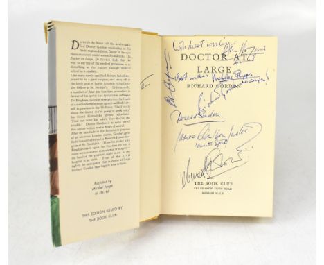 DOCTOR AT LARGE; a Book Club edition bearing multiple signatures of the cast.We have not authenticated these signatures, plea