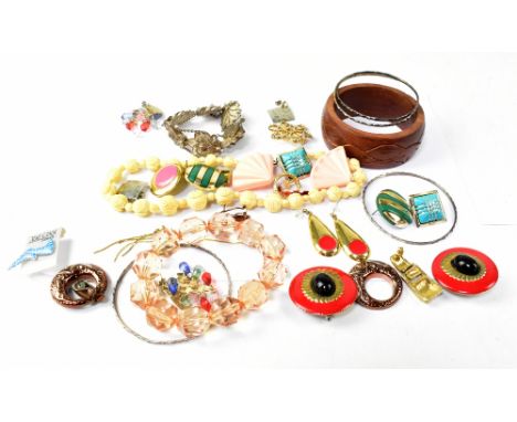 A quantity of costume jewellery to include bar brooches, stick pins, necklaces, white metal items, etc.