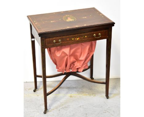 An Edwardian mahogany inlaid and satinwood crossbanded combination games/sewing table, the baize lined fold-over top decorate