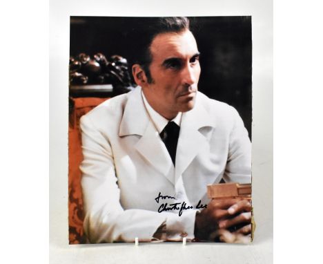 CHRISTOPHER LEE; a coloured photograph of the acting star, bearing his signature, 25 x 20cm.We have not authenticated this si