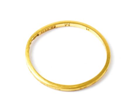 A 22ct yellow gold thin wedding band, size K, approx 1g.