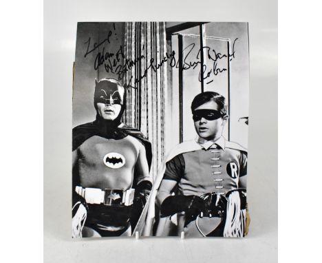 BATMAN; a reproduced black and white photograph bearing the signatures of Adam West and Burt Ward, inscribed 'Keep punching',