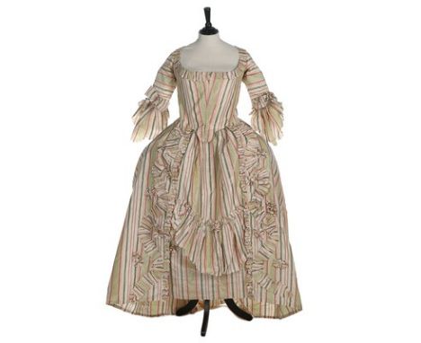 A striped chine taffeta robe à la polonaise, 1770s, the silk woven in shades of green pink and ivory, the open robe with clos