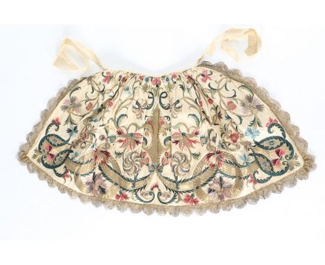 The Bentinck Apron, English, circa 1720-30, of ivory tabby silk, lavishly embroidered in lustrous gold thread and coloured si