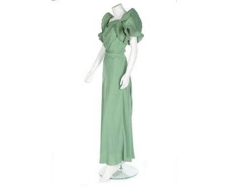 A Jeanne Lanvin couture pale green silk crêpe Romain evening gown, model 'Pasiphaé', Winter, 1934, unlabelled, the dress with