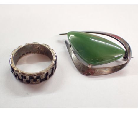 Sterling silver jade set brooch and a hallmarked silver ring size O