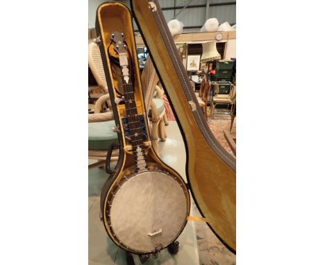 Cased banjo with inlaid Mother of Pearl frets and steel drum circa 1914-1915
