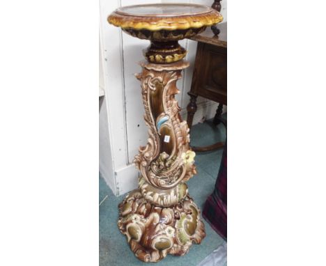 A large ceramic pedestal, 96cm high Condition Report: Some small amount of damage and chips.
