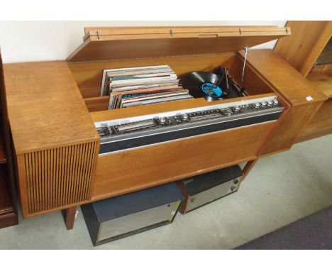 A Decca SRG 899 stereogram in teak cabinet, two record players and records Condition Report: Available upon request