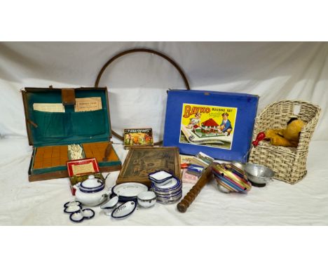 Various vintage toys and games to include Bayko building set, Mahjong, Tiddly Winks, several card games, spinning top, wooden