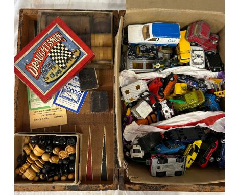 A folding Backgammon board in the form of two books with counters, wooden chess set, boxed draughts set, two miniature books 