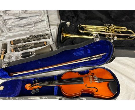 A selection of musical instruments to include Clarinet 'Odessey'' by Hermes USA,  Skylark Chinese violin with 27.5cm back   c