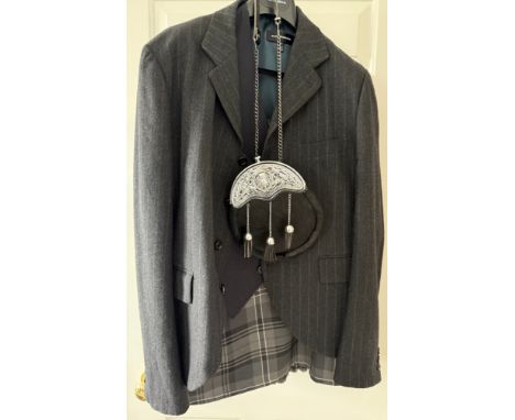 The Kilt, size 34, Club Monaco waistcoat, size L, Comme Des Garcons jacket, size L, Sporran belt, size 36. Kilt pin and sock 