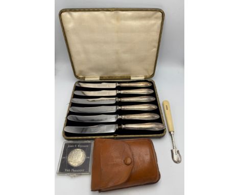 A miscellany to include Maniago folding campaign cutlery set in original leather case, a Frosts orange peeler, a JFK 1/2 doll