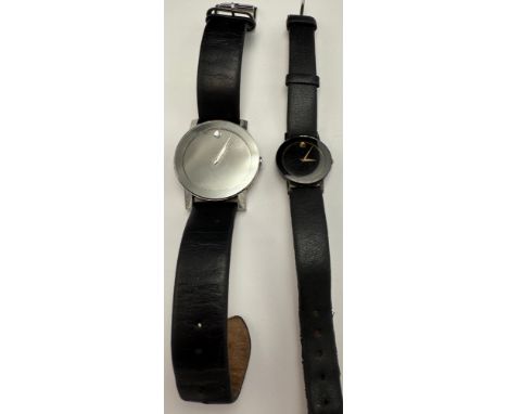 Two vintage Movado wristwatches, both with black leather straps. One original case.