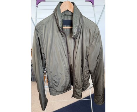 A Prada gentleman's short jacket hood in collar. Labelled L.
