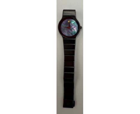 Movado quartz wristwatch with black metal strap and mother of pearl face.