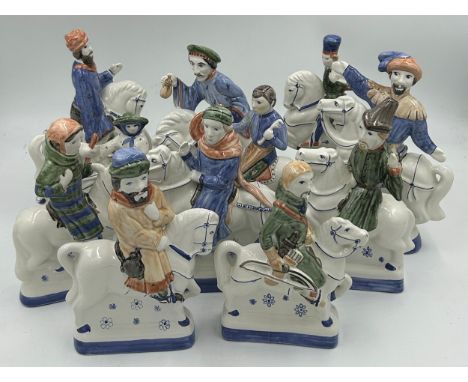 A collection of Rye Pottery 'Canterbury Tales' figures on horseback to include The Oxford Cleric, The Knight, The Yeoman, The