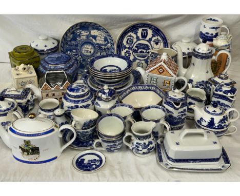 A large collection of Ringtons tea ceramics to include The Heritage Collection, metal tea caddy, Centenary collection, 1960's