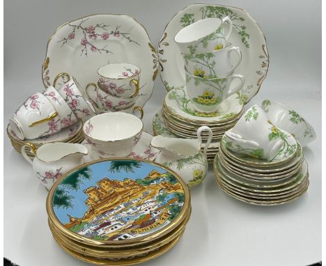 An Adderley China part tea service 'Chinese Blossom' comprising of cake plate, 6 x plates 15.5cm, 6 x saucers 14cm, 6 x teacu