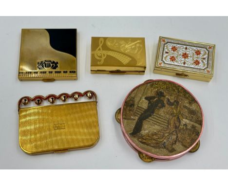 Collection of five musical compacts to include a Volupte piano compact, a Coty New York with 6 bells, two Elgin American musi