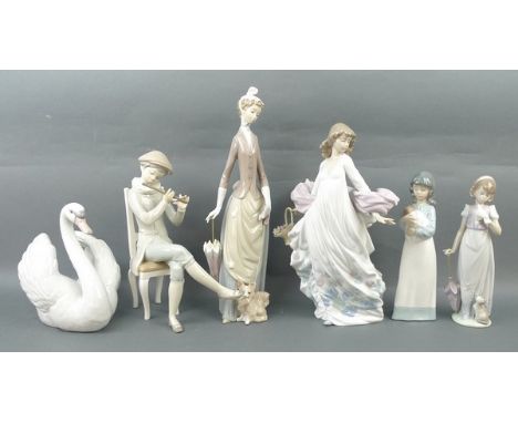 A group of Lladro and Nao porcelain figures, comprising; a swan, seated boy playing a flute, girl with a shawl, lady with a P