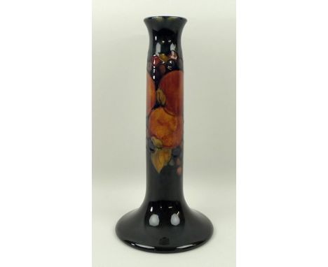 A Moorcroft pottery candle table lamp base of cylindrical form, on an outswept base, decorated in the 'Pomegranate' pattern, 