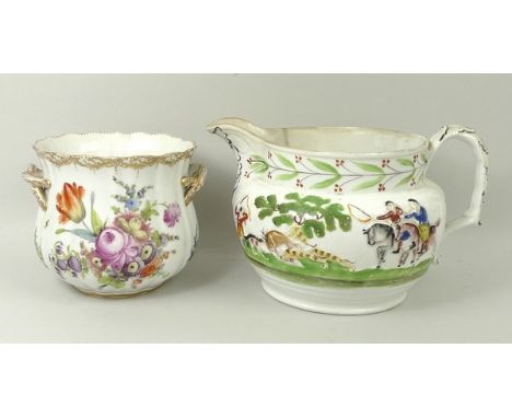 A Dresden porcelain cache pot, early 20th century, painted with Europeanische flowers 12cm high, and a Staffordshire water ju