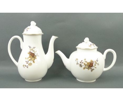 A Royal Worcester porcelain part tea and coffee service decorated in the 'Autumn Gold' pattern, comprising; teapot, coffee po