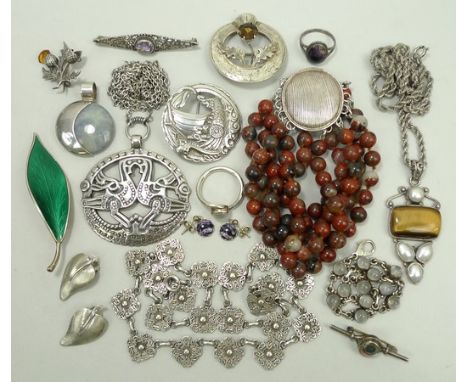 A quantity of silver designer and costume jewellery including a Shetland Jewellery Nordic ship brooch, two thistle brooches a