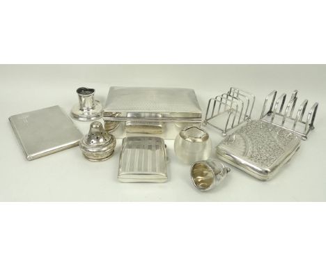 A pair of silver toast racks, Sheffield 1927, cigarette box with engine turned decoration, three cigarette cases and various 