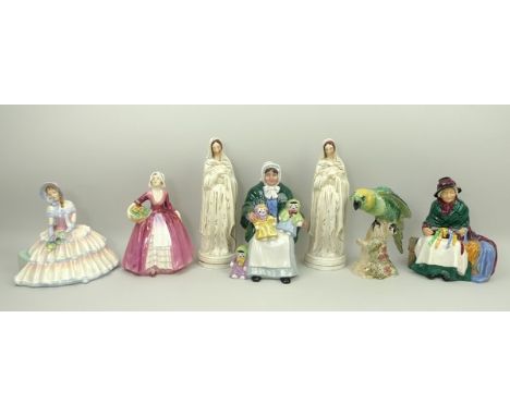 A group of Royal Doulton porcelain figures, comprising 'Daydreams' HN1731, 'Silks and Ribbons' HN2017, 'Janet' HN1537, and 'T