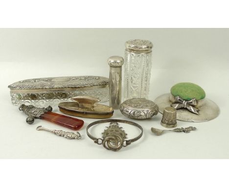 A 19th century silver and agate rattle indistinctly hallmarked; an oval glass pin box with silver lid, Birmingham 1903; a gla