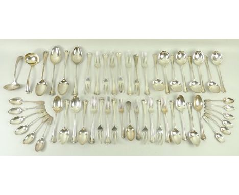 A collection of silver flatware comprising a set by Atkins and Co, Sheffield, of eight dinner forks, eight dessert forks, eig