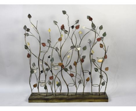 A Modern Metal Tea Light Stand to hold nine Lights in the Form of Plants, 72cms Wide 