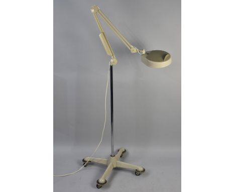 A Mid 20th Century Luxo Adjustable Work Lamp on Stand with Castors 