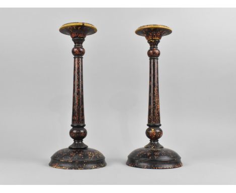 A Pair of Indian Kashmiri Lamp Bases with Polychrome Decoration in Red on Black Ground, 31cms High 