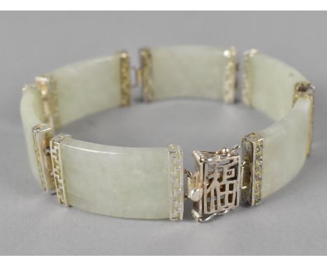 A Chinese Jade and Silver Sectional Bracelet with Six Jade Panels 