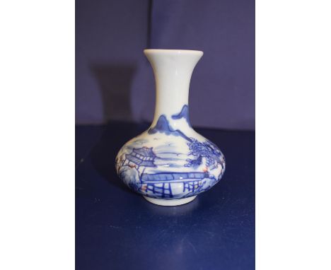 A small Chinese blue &amp; white bottle vase 11cm tall 