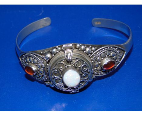 A vintage 925 silver bangle/bracelet with opal &amp; amber decoration, with pill box opening to top 