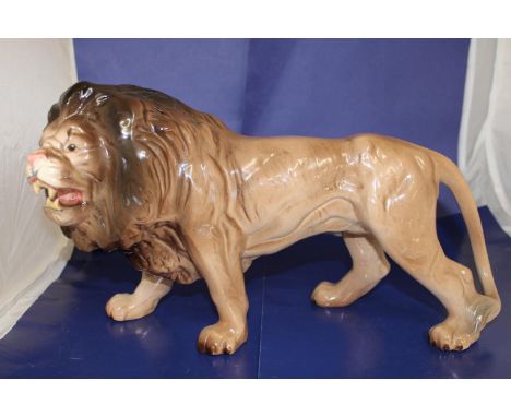 A large Melba ware ceramic lion 34cm x 22cm 