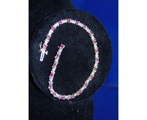 A 9ct gold ruby &amp; diamond bracelet 