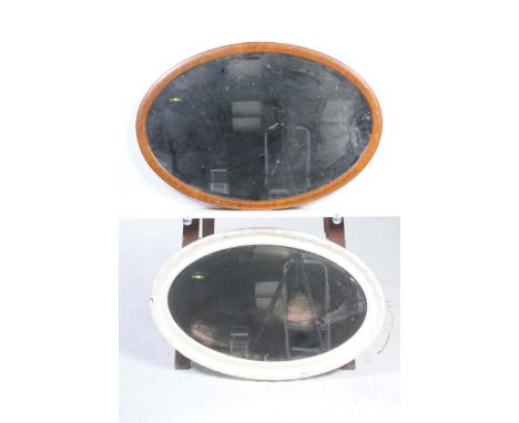 Two oval wall mirrors
To include an Edwardian inlaid mahogany mirror and a painted oval mirror. (2)
