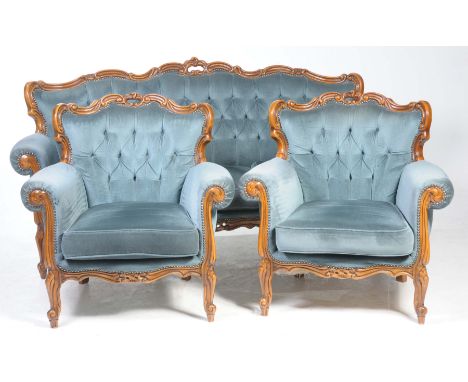 A French style three piece lounge suite, 20th Century
Each with a carved C scroll frame and padded button back above loose cu