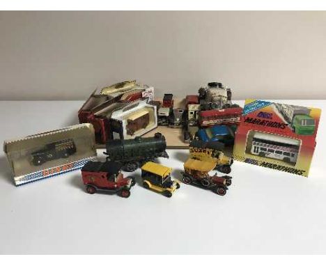 A tray of die-cast vehicles including Dinky, Lledo, Day's Gone, some parts boxed, a mid twentieth century tin plated engine, 