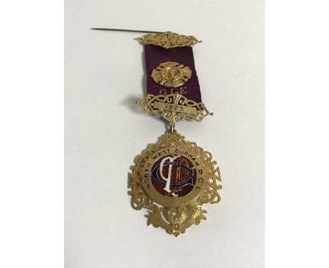 A 9ct gold and enamel Royal Order of Buffaloes medal, 'Presented to Bro George Harwood K.O.M.', upon 9ct gold suspender and r