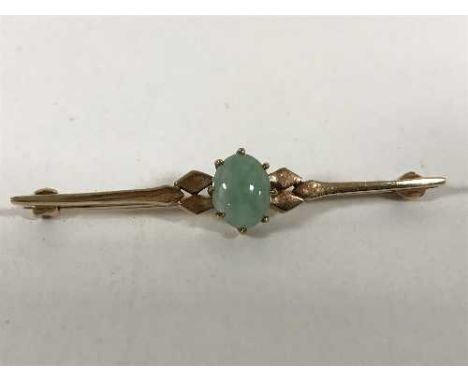 A 9ct gold and jade bar brooch