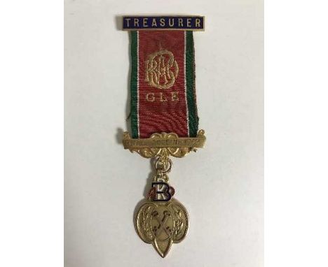 A 9ct gold and enamel lodge medal, 8.3g, upon gilt metal suspender with ribbon