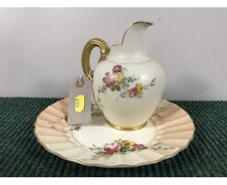 A Royal Worcester hand painted blush ivory gilt handled jug, height 14 cm and a A Royal Worcester hand painted blush ivory pl